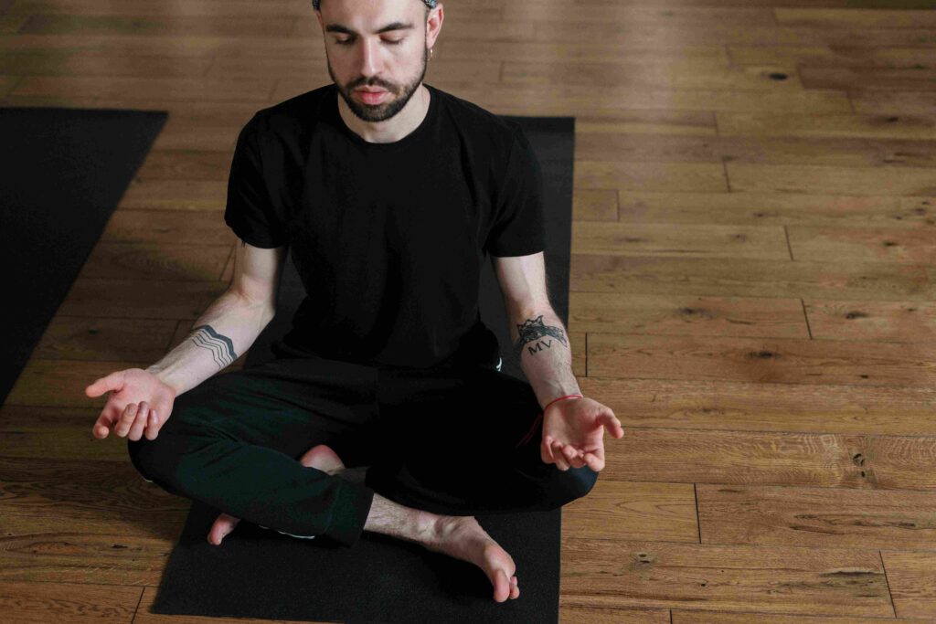 Man journaling daily habit to improve focus and discipline